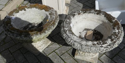 Lot 1532 - A pair of concrete circular squat footed...
