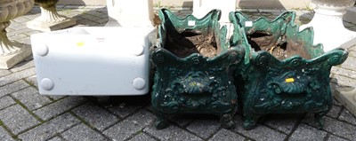 Lot 1533 - A pair of green painted wrought metal shaped...