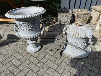 Lot 1544 - A grey painted cast iron twin handled pedestal...