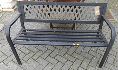 Lot 1520 - A modern black painted metal two-seater garden...