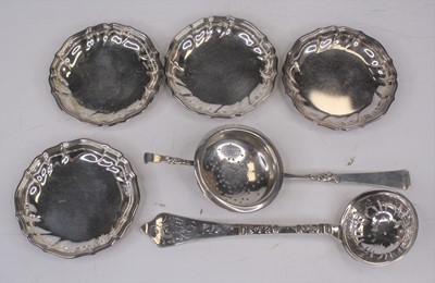 Lot 305 - A continental white metal sifting spoon;...