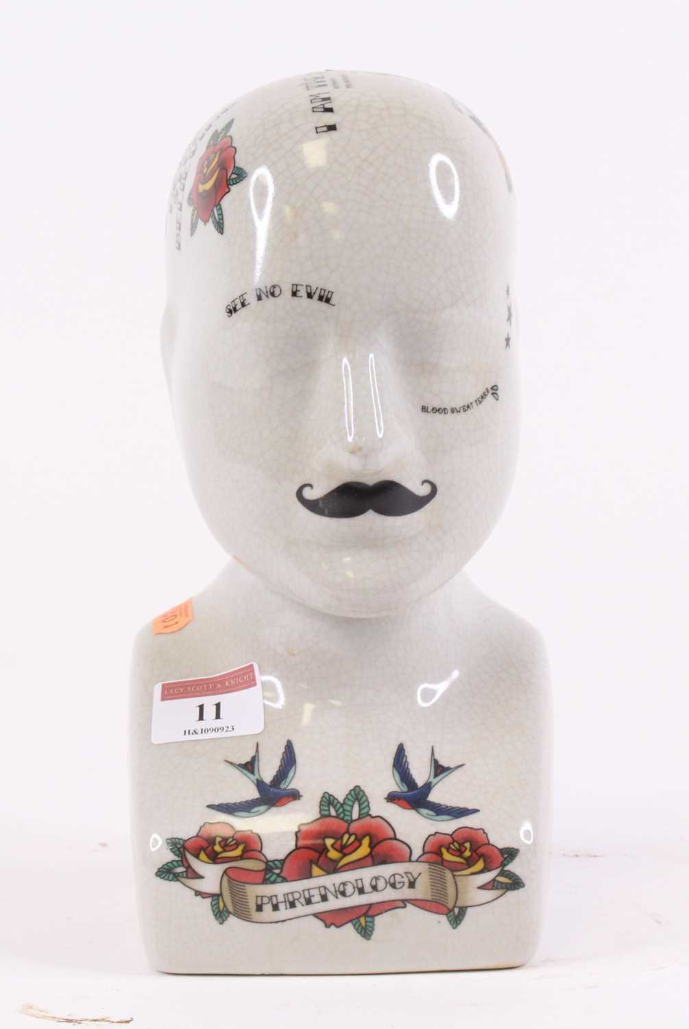 Lot 11 - A reproduction phrenology bust, height 23.5cm