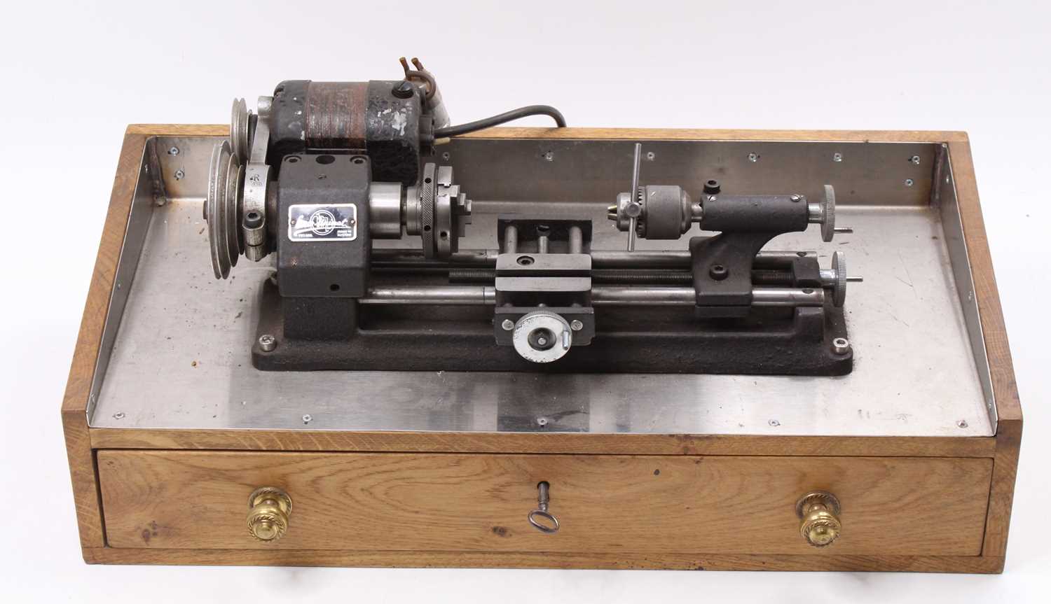 Lot 79 - 1960s Emco Unimat SL tabletop lathe, housed on...
