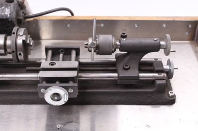 Lot 79 - 1960s Emco Unimat SL tabletop lathe, housed on...