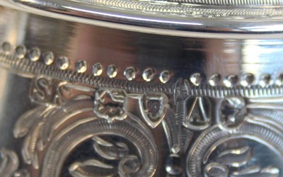 Lot 2092 - A Victorian silver teapot and matching cream,...