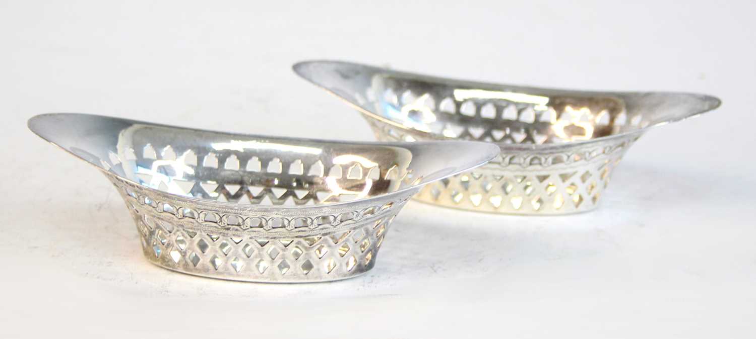 Lot 2093 - A pair of Victorian silver bonbon dishes, of...