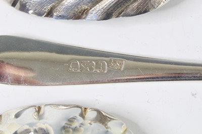 Lot 2066 - A pair of George III silver berry spoons, each...