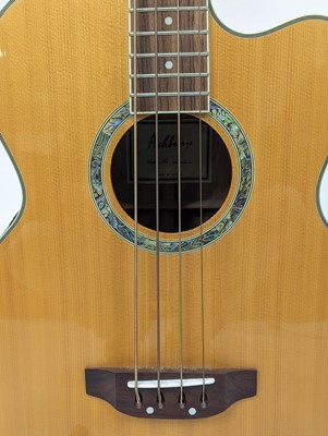 Lot 520 - An Ashbury GR5648 electro-acoustic bass guitar,...
