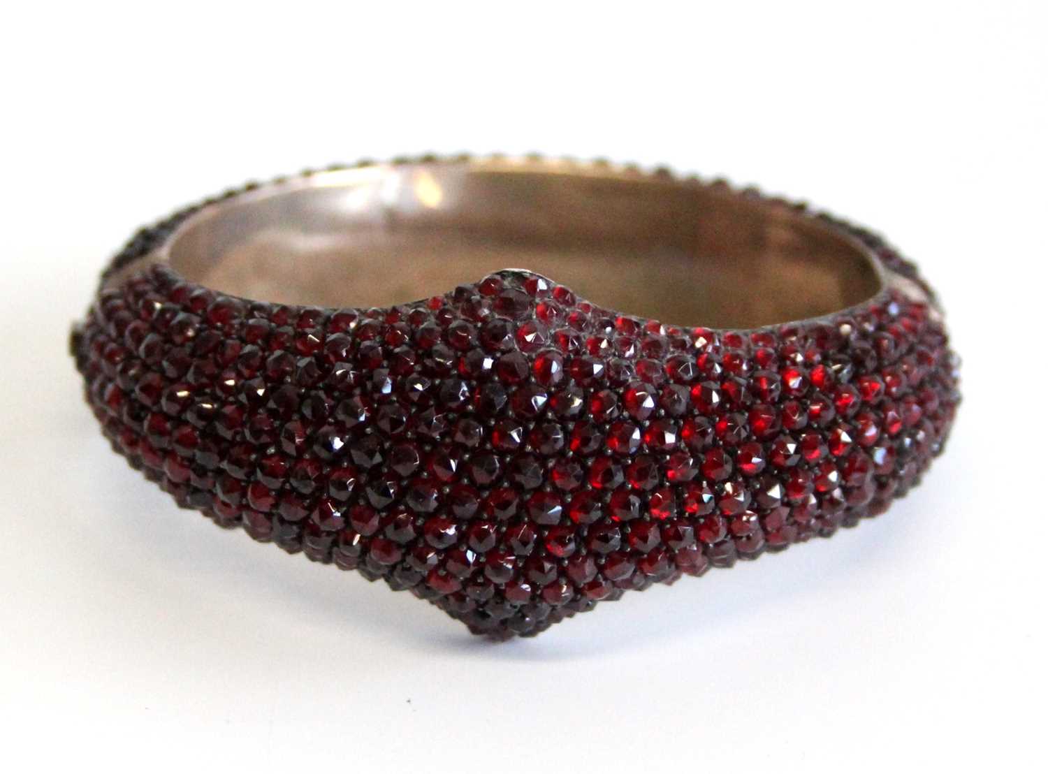 Lot 2674 - A late Victorian rose cut garnet pavé set...