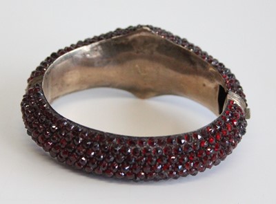 Lot 2674 - A late Victorian rose cut garnet pavé set...
