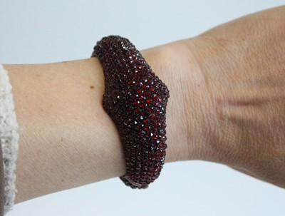 Lot 2674 - A late Victorian rose cut garnet pavé set...