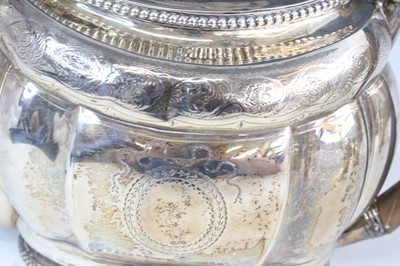 Lot 1069 - A George III silver matched three-piece tea...