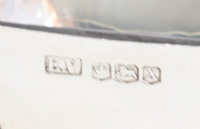 Lot 1068 - Three pieces of table silver, comprising a...
