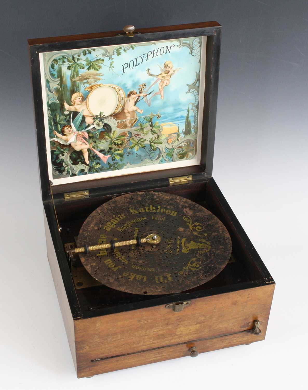 Lot 640 - A late 19th century German polyphon, in walnut...