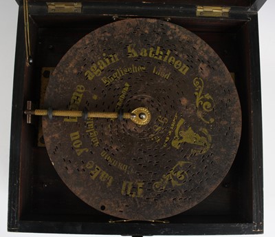 Lot 640 - A late 19th century German polyphon, in walnut...