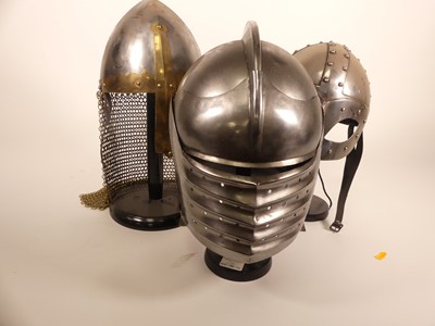 Lot 16 - A collection of reproduction metal helmets