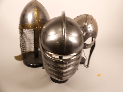 Lot 16 - A collection of reproduction metal helmets