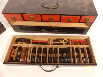 Lot 20 - An early 20th century black leather clad...