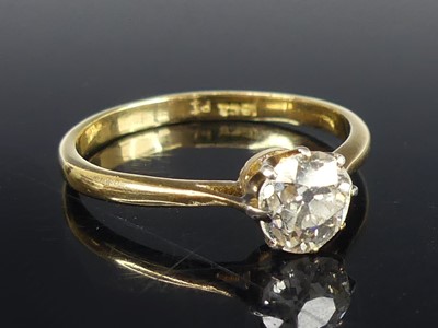 Lot 2825 - A yellow and white metal diamond solitaire...