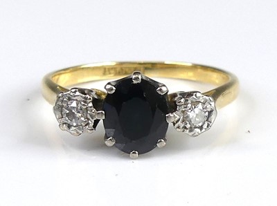 Lot 2828 - A yellow and white metal, sapphire and diamond...