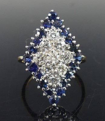 Lot 2831 - An 18ct yellow and white gold, sapphire and...