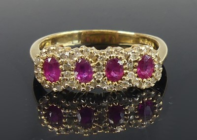 Lot 2834 - An 18ct yellow gold, ruby and diamond...