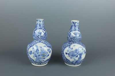 Lot 1 - A pair of Chinese blue and white double gourd...