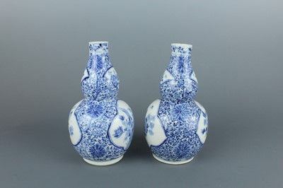 Lot 1 - A pair of Chinese blue and white double gourd...