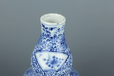 Lot 1 - A pair of Chinese blue and white double gourd...