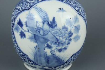 Lot 1 - A pair of Chinese blue and white double gourd...