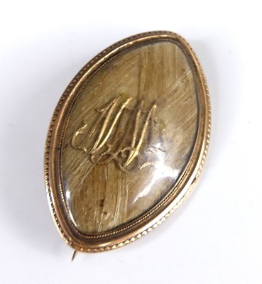 Lot 2812 - A George III yellow metal mourning pendant...