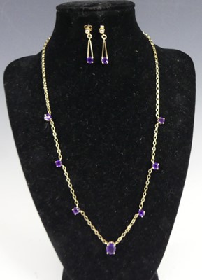Lot 2836 - A 9ct gold amethyst set pendant, arranged as...
