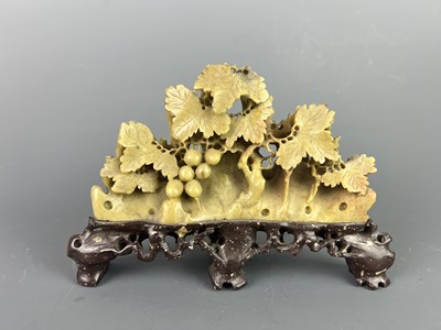 Lot 47 - Two Chinese soapstone carvings of a brush rest...