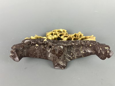 Lot 47 - Two Chinese soapstone carvings of a brush rest...