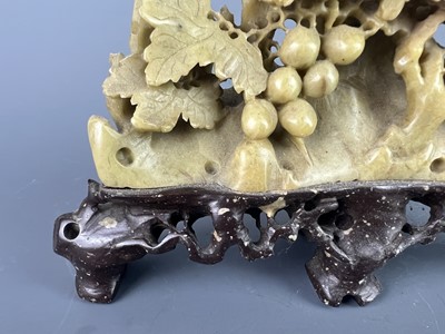 Lot 47 - Two Chinese soapstone carvings of a brush rest...