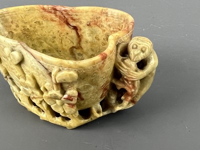 Lot 47 - Two Chinese soapstone carvings of a brush rest...