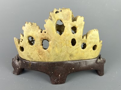 Lot 47 - Two Chinese soapstone carvings of a brush rest...