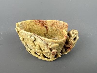 Lot 47 - Two Chinese soapstone carvings of a brush rest...