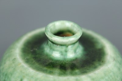 Lot 56 - A Chinese peachbloom-glazed apple-shaped water...