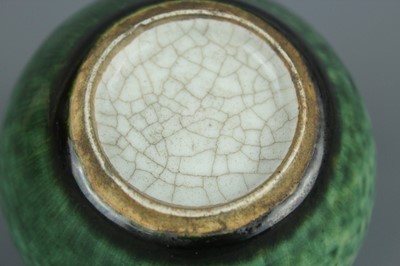 Lot 56 - A Chinese peachbloom-glazed apple-shaped water...