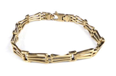 Lot 2842 - A modern 9ct gold gatelink bracelet, with...