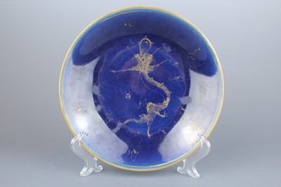 Lot 65 - A pair of Chinese blue ground gilded “dragon”...