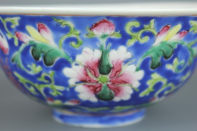 Lot 71 - A Chinese famille rose blue ground “flowers...