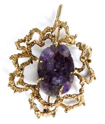 Lot 2845 - A modern yellow metal amethyst geode set...