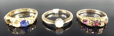 Lot 2868 - A 9ct gold ruby and diamond set half-hoop ring,...