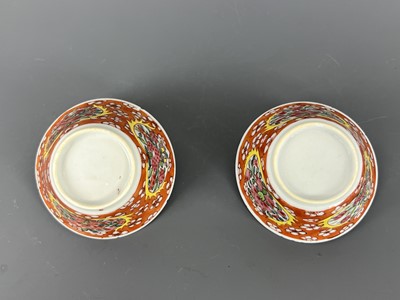 Lot 93 - A pair of Chinese famille rose “flowers” cups,...