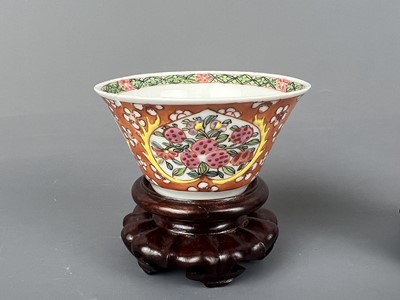 Lot 93 - A pair of Chinese famille rose “flowers” cups,...