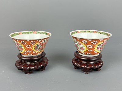 Lot 93 - A pair of Chinese famille rose “flowers” cups,...