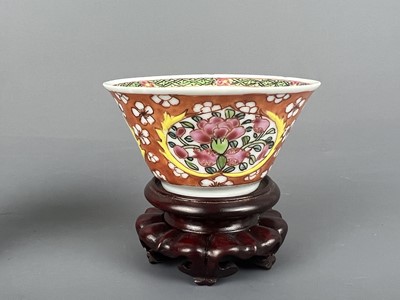 Lot 93 - A pair of Chinese famille rose “flowers” cups,...