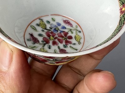 Lot 93 - A pair of Chinese famille rose “flowers” cups,...